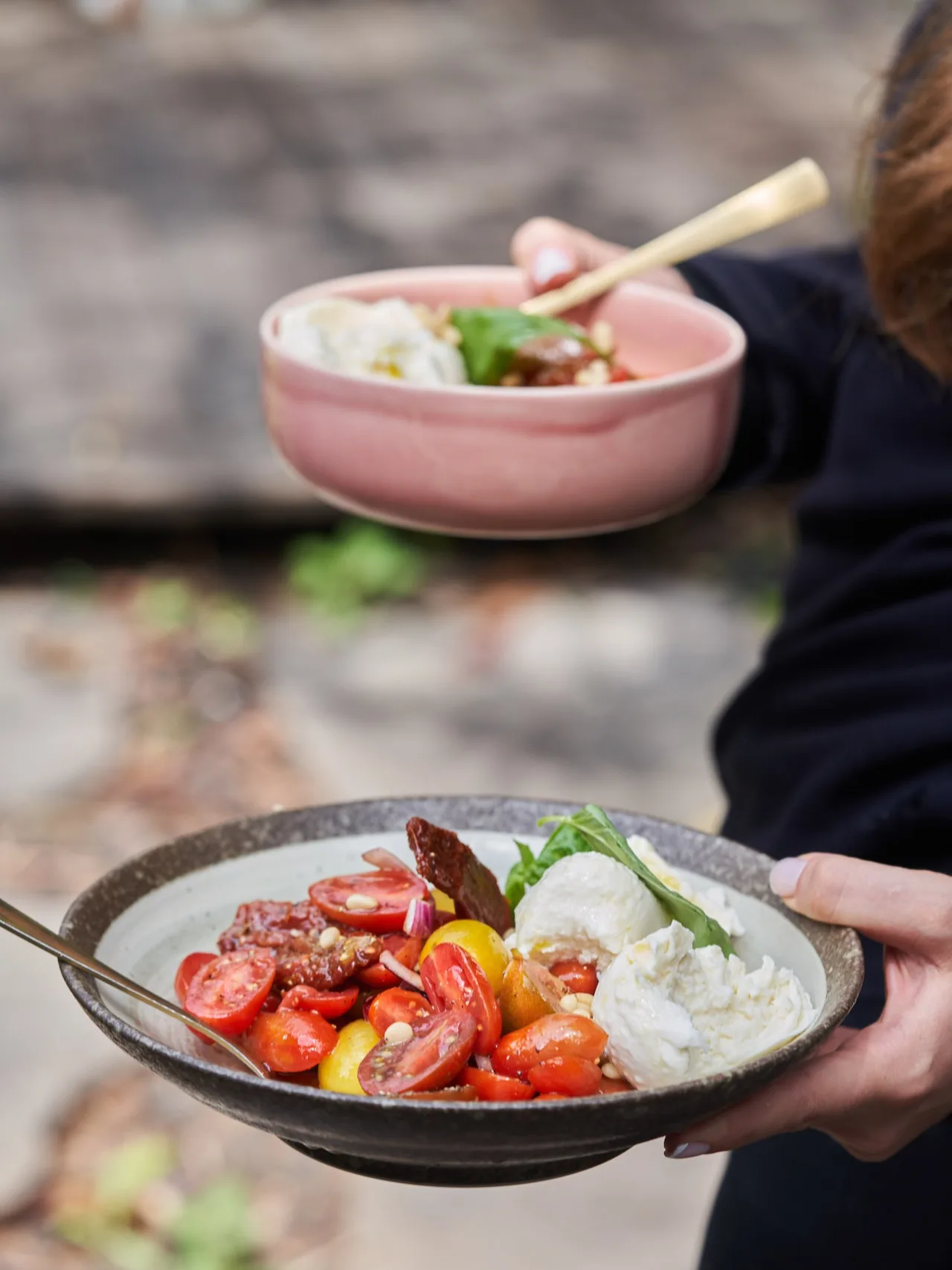 Plates of tomatoes and cheese served at The Belina